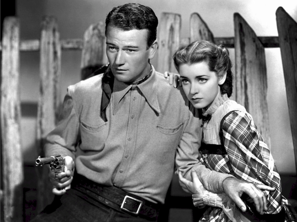 John Wayne and Masha Hunt